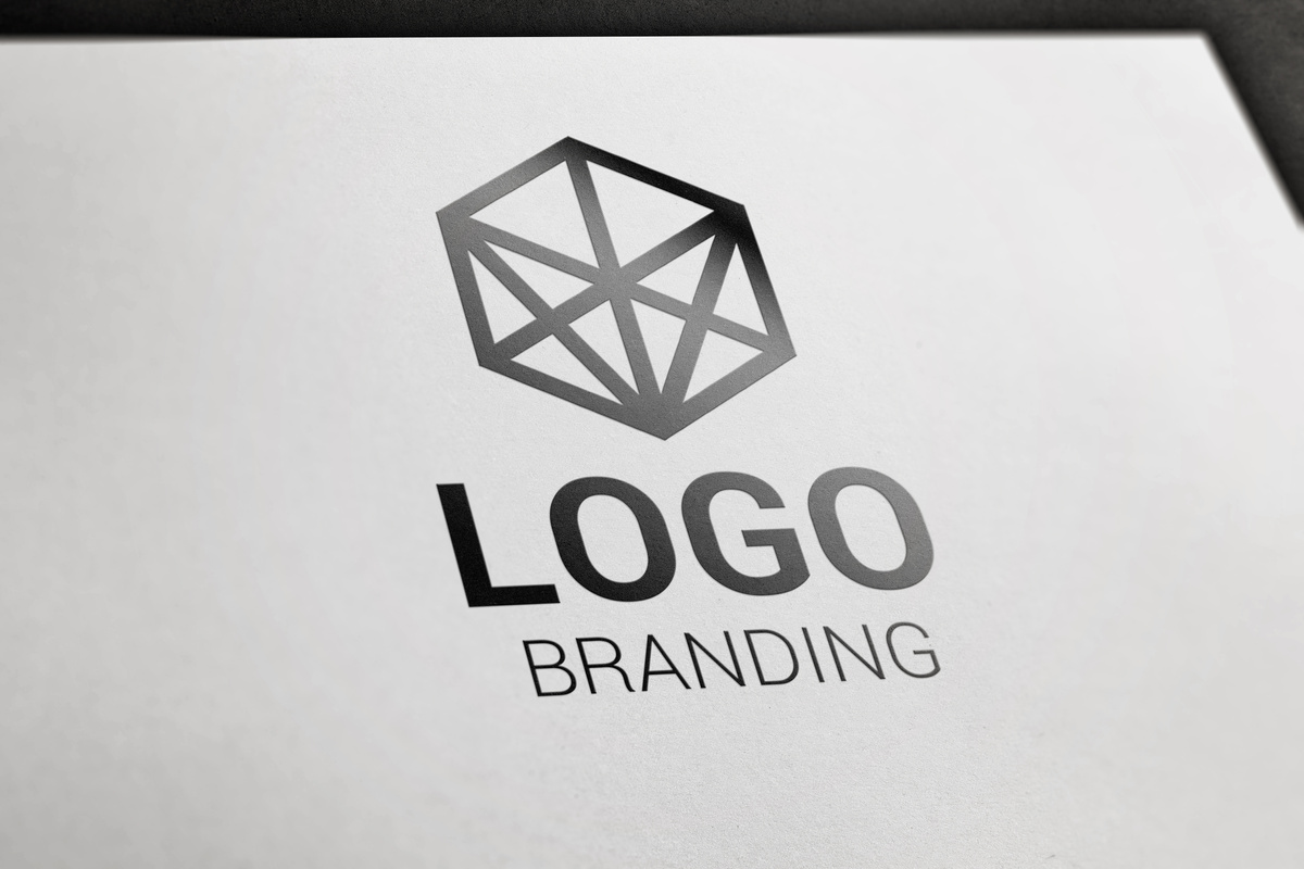 Logo branding concept on white paper. Profesional logo design company presentation